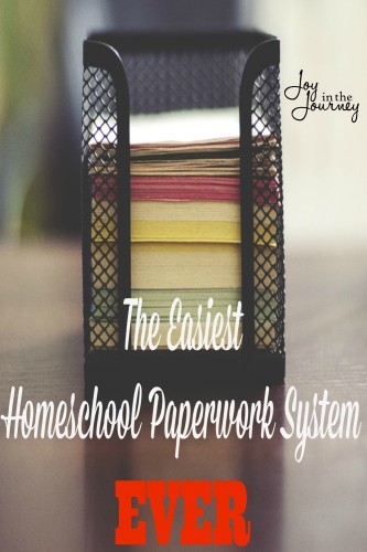 The Easiest Homeschool Paperwork System EVER!! As a homeschool mom I bet you sometimes feel OVERWHELMED at the thought of homeschool paperwork. I have found the easiest homeschool paperwork system ever.